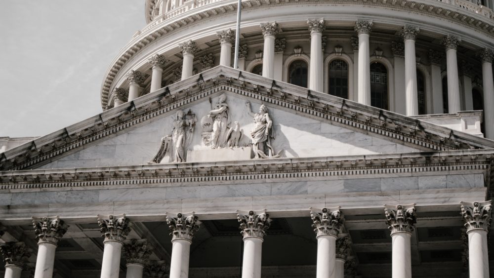 Close-up of the facade of the U.S. Capitol building.