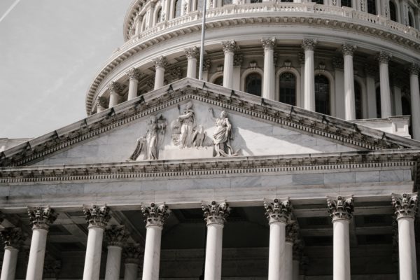 Close-up of the facade of the U.S. Capitol building.