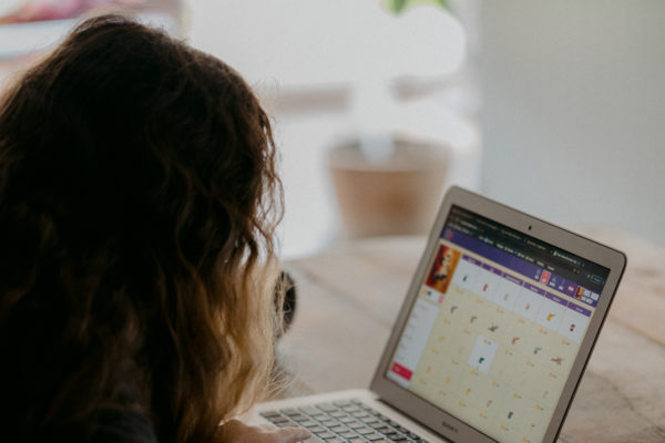 Girl Sitting In Front Of Computer