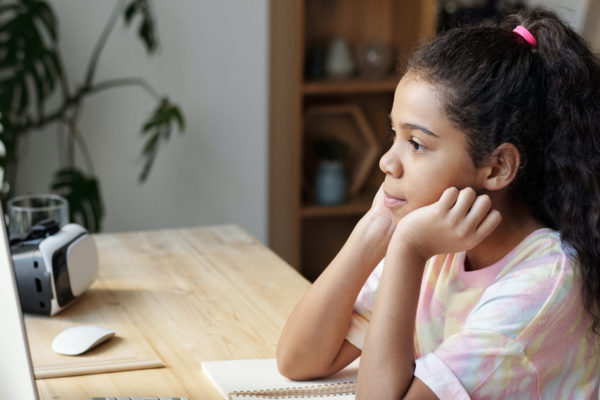 Girl Sitting By The Table